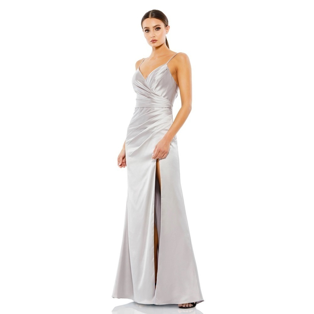 Mac Duggal Silver gown sz 10. 
Get ready for prom or graduation parties!!